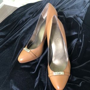 Talbots tan heels 4” heels. Size 8 1/2”. Man-made uppers with leather soles.